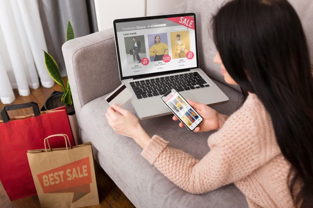 Woman keying in her card details when shopping online